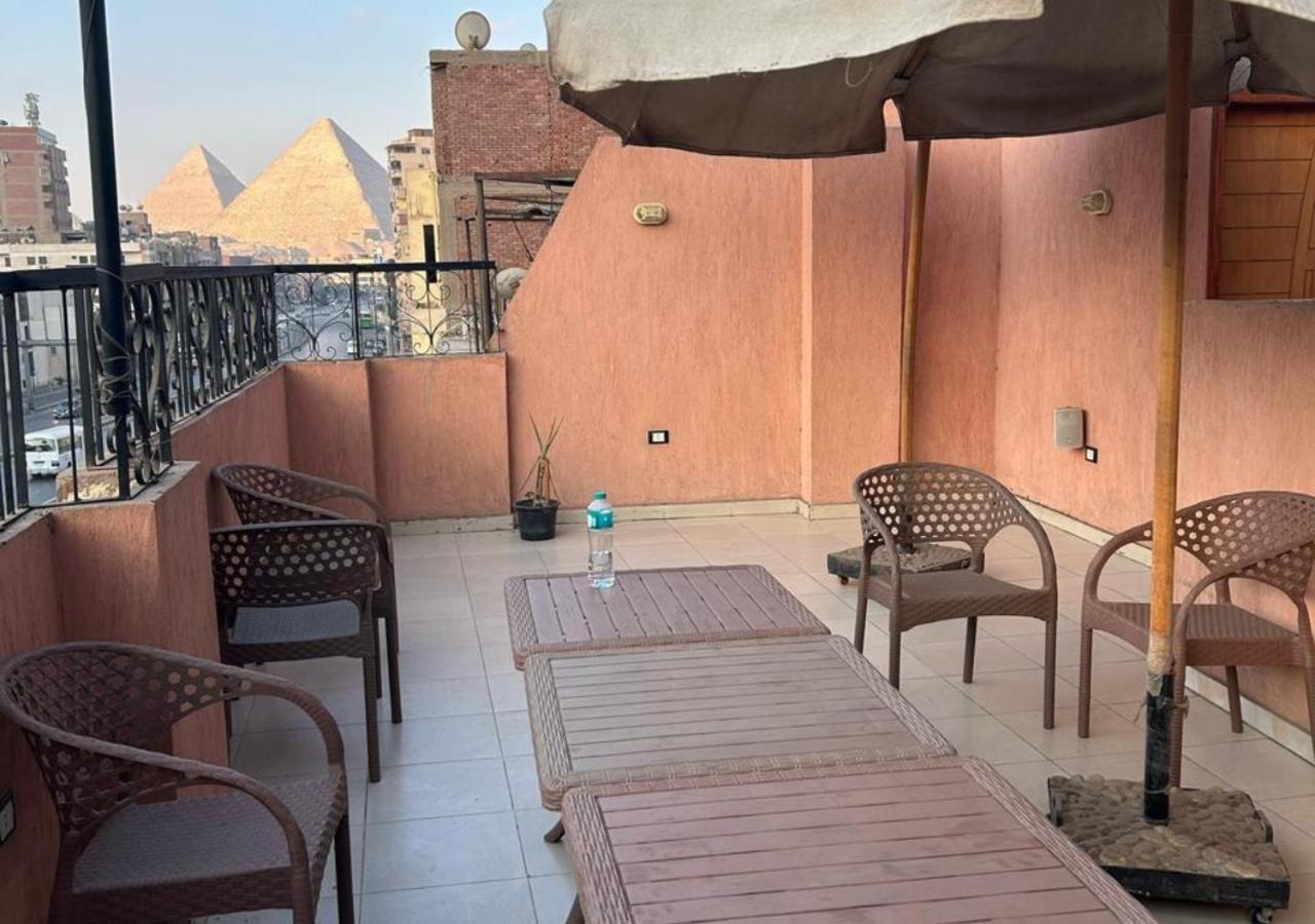 Pyramids Road Guest House Cozy Rooms And Rooftop Breakfast With The Pyramids View Nazlet el-Sisi Exterior photo
